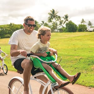 Dad and son biking