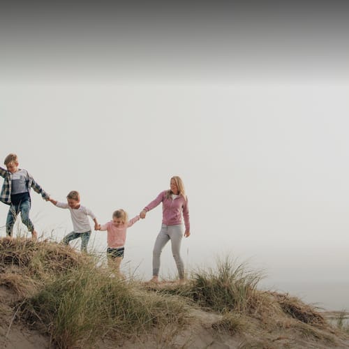 Family climbing a mountain